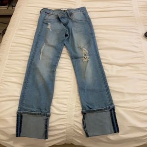 light blue capris jeans with small rips